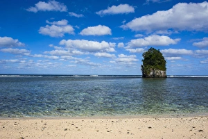 Single rock at coconut point in Tutuila island, American Samoa, South Pacific Single rock at coconut point in Tutuila island, American Samoa, South Pacific