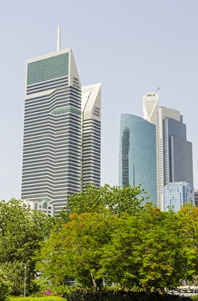 Small park and downtown skyline of Dubai, United Arab Emirates (UAE) Small park and downtown skyline of Dubai, United Arab Emirates (UAE)