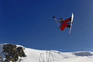Snowboarder jumping in halfpipe, Klein Matterhorn, Zermatt, Switzerland, Model Released Snowboarder jumping in halfpipe, Klein Matterhorn, Zermatt, Switzerland, Model Released