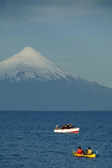South America, Chile, Puerto Varas. Boats on Llanquihue Lake with the Osorno Volcano South America, Chile, Puerto Varas. Boats on Llanquihue Lake with the Osorno Volcano