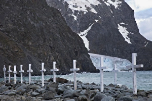 South Atlantic, South Orkney Islands, Laurie Island. Grave markers in stony beach South Atlantic, South Orkney Islands, Laurie Island. Grave markers in stony beach