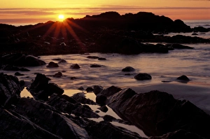 Sunrise over the Atlantic Ocean from the rocky coast. Wallis Sands State Park, Rye, NH Sunrise over the Atlantic Ocean from the rocky coast. Wallis Sands State Park, Rye, NH