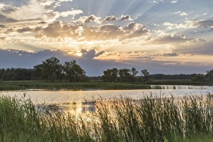 Sunrise over backwater of the Milk River near Glasgow, Montana, USA Sunrise over backwater of the Milk River near Glasgow, Montana, USA