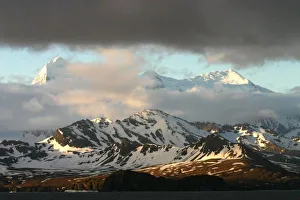 Sunrise over the mountain ranges on South Georgia Island Sunrise over the mountain ranges on South Georgia Island