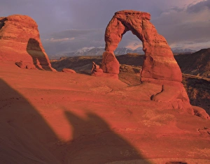 Sunset light on Delicate Arch wit the La Sal Mountains in the background, Arches nat'l Park Sunset light on Delicate Arch wit the La Sal Mountains in the background, Arches nat'l Park
