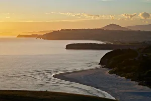 Sunset over Smaills Beach, Dunedin, South Island, New Zealand Sunset over Smaills Beach, Dunedin, South Island, New Zealand