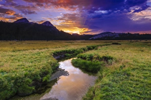 Sunset over Tuolumne Meadows along Budd Creek, Yosemite National Park, California Sunset over Tuolumne Meadows along Budd Creek, Yosemite National Park, California