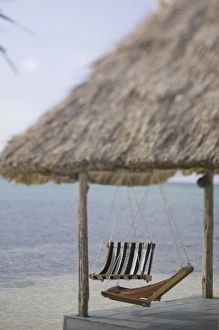 Swinging Chairs at Turneffe Caye resort, Belize Swinging Chairs at Turneffe Caye resort, Belize