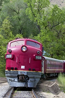 The Thunder Mountain Line scenic tourist train traveling along the Payette River The Thunder Mountain Line scenic tourist train traveling along the Payette River