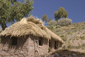 Traditional house with thatched roof, Taquile Island (also known as Isla Taquile) Traditional house with thatched roof, Taquile Island (also known as Isla Taquile)