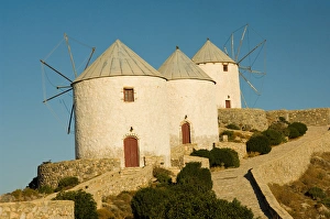 Traditional wind mills in Pandelli. Leros, Dodecanese Islands, Greece Traditional wind mills in Pandelli. Leros, Dodecanese Islands, Greece