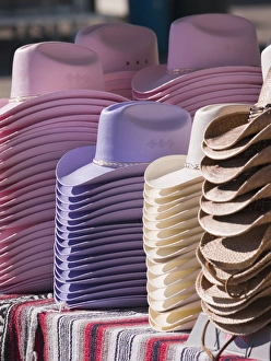 Tucson, Arizona. Cowboy hats for men and women on sale at the Tucson Rodeo Tucson, Arizona. Cowboy hats for men and women on sale at the Tucson Rodeo