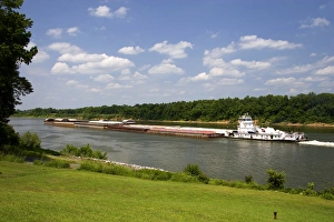 A tugboat and river barge on the Tennessee River at Shiloh, Tennessee A tugboat and river barge on the Tennessee River at Shiloh, Tennessee