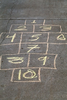 United States. Childrens hop scotch game drawn on sidewalk United States. Childrens hop scotch game drawn on sidewalk