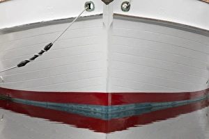 USA, Alaska, Hoonah. Bow of a boat reflects in water USA, Alaska, Hoonah. Bow of a boat reflects in water