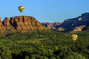 USA, Arizona. Hot-air balloons floats over Red Rocks State Park USA, Arizona. Hot-air balloons floats over Red Rocks State Park