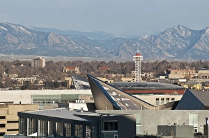 USA, CO, Denver. View west to Rocky Mountains over tops of Denver buildings including USA, CO, Denver. View west to Rocky Mountains over tops of Denver buildings including
