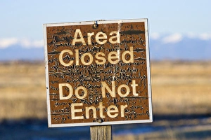 USA, Colorado. An aged warning sign in the Monte Vista National Wildlife Refuge USA, Colorado. An aged warning sign in the Monte Vista National Wildlife Refuge
