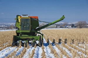 USA, Colorado, Montrose, combine in snowy field USA, Colorado, Montrose, combine in snowy field