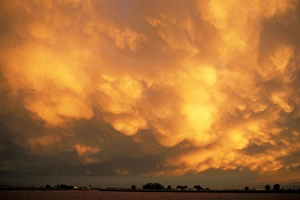 USA, Idaho. Underside of thunder storm at sunset USA, Idaho. Underside of thunder storm at sunset