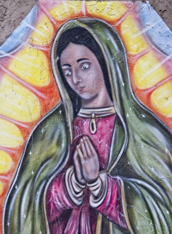 USA, New Mexico, Chimayo - Painting representing the Virgin of Guadalupe on the outside USA, New Mexico, Chimayo - Painting representing the Virgin of Guadalupe on the outside