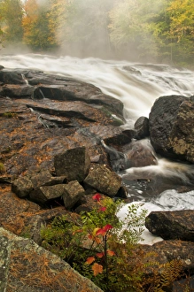 USA, New York, Inlet. Mist over rushing stream USA, New York, Inlet. Mist over rushing stream