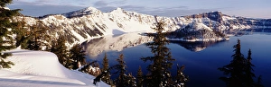 USA, Oregon, Crater Lake National Park, View of snow covered mountains with Crater lake USA, Oregon, Crater Lake National Park, View of snow covered mountains with Crater lake