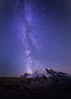 USA, Washington State, Mt. Rainier National Park. Stars and the Milky Way light the sky above Mt USA, Washington State, Mt. Rainier National Park. Stars and the Milky Way light the sky above Mt