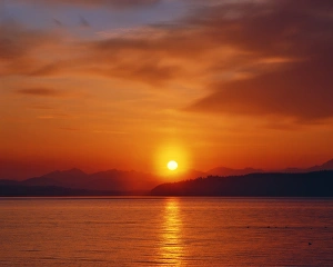 USA, Washington. Sunset over the Olympic Mountains and Puget Sound USA, Washington. Sunset over the Olympic Mountains and Puget Sound