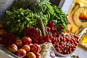 Venice, Italy. Bundle of Fresh Herbs, red Picante Peppers, onions, and tomatoes Venice, Italy. Bundle of Fresh Herbs, red Picante Peppers, onions, and tomatoes