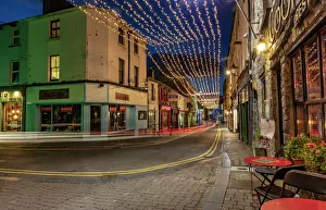 Vibrant streets at dusk in downtown Galway, Ireland Vibrant streets at dusk in downtown Galway, Ireland