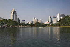 View of lake and buildings, Bangkok, Thailand View of lake and buildings, Bangkok, Thailand