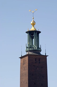 View to Stadshuset, the City Hall, over the Riddarfjarden, with its iconic tower with three crowns View to Stadshuset, the City Hall, over the Riddarfjarden, with its iconic tower with three crowns