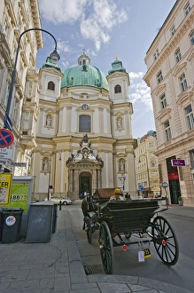 A view down a street in Viennia Austria looking at St. Peters Church A view down a street in Viennia Austria looking at St. Peters Church