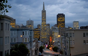 View of the TransAmerica Building from Montogomery Street just a dusk with the traffic View of the TransAmerica Building from Montogomery Street just a dusk with the traffic