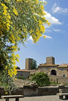 View of Tuscania from Bastianini Square and Etruscan sarcophagus, Viterbo province View of Tuscania from Bastianini Square and Etruscan sarcophagus, Viterbo province
