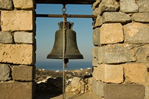 Warning Bells at the restored part of Pandelli Castle. Leros, Dodecanese Islands, Greece Warning Bells at the restored part of Pandelli Castle. Leros, Dodecanese Islands, Greece