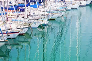 Images Dated 22nd August 2019: White sailboats in blue water