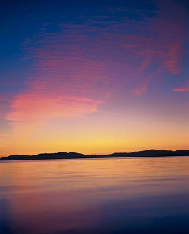 WILLARD BAY STATE PARK, UTAH. USA. Cirrus undulatus cloud above Willard Bay at dusk WILLARD BAY STATE PARK, UTAH. USA. Cirrus undulatus cloud above Willard Bay at dusk