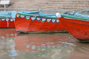 Wooden boats in Ganges river, Varanasi, India Wooden boats in Ganges river, Varanasi, India