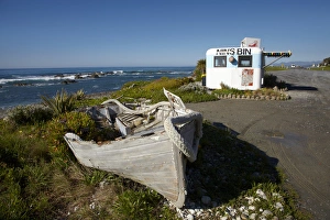 Wooden dinghy, and Nins Bin lobster caravan, Kaikoura Coast, Marlborough, South Island Wooden dinghy, and Nins Bin lobster caravan, Kaikoura Coast, Marlborough, South Island