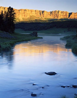 WYOMING. USA. Brooks Lake Creek & Brooks Lake below Breccia Cliffs at sunrise WYOMING. USA. Brooks Lake Creek & Brooks Lake below Breccia Cliffs at sunrise