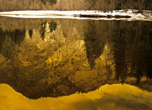 Yosemites granite forms reflect in the calm waters of the Merced River Yosemites granite forms reflect in the calm waters of the Merced River