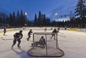 Youth hockey action at Woodland Park in Kalispell, Montana, USA Youth hockey action at Woodland Park in Kalispell, Montana, USA