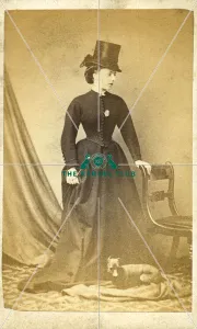 Manchester Terrier with woman wearing riding hat Manchester Terrier with woman wearing riding hat
