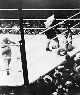 American boxer. Gene Tunney down for the famous long count in the championship bout with Dempsey at Soldier Field American boxer. Gene Tunney down for the famous long count in the championship bout with Dempsey at Soldier Field