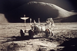 APOLLO 15, 1971. Jim Irwin standing by the lunar rover, Mount Hadley in the background APOLLO 15, 1971. Jim Irwin standing by the lunar rover, Mount Hadley in the background
