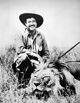 ERNEST HEMINGWAY (1899-1961). American writer. Hunting in Kenya, February 1934 ERNEST HEMINGWAY (1899-1961). American writer. Hunting in Kenya, February 1934