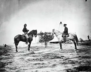 GEORGE CUSTER (1839-1876). American army officer. Custer, left GEORGE CUSTER (1839-1876). American army officer. Custer, left