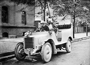 GERMANY: ARMED CAR. German automobile with a cannon in the back GERMANY: ARMED CAR. German automobile with a cannon in the back